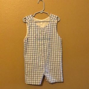 Blue and white smocked overalls.